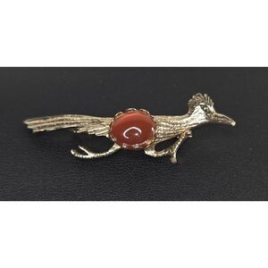 Roadrunner Gold Tone Red Stone Center